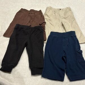 Set of 4 baby pants- size 9 months 1- khaki 1- brown 1- black 1- blue sweatpants